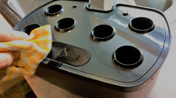 Empty AeroGarden on the Kitchen Counter During Cleaning